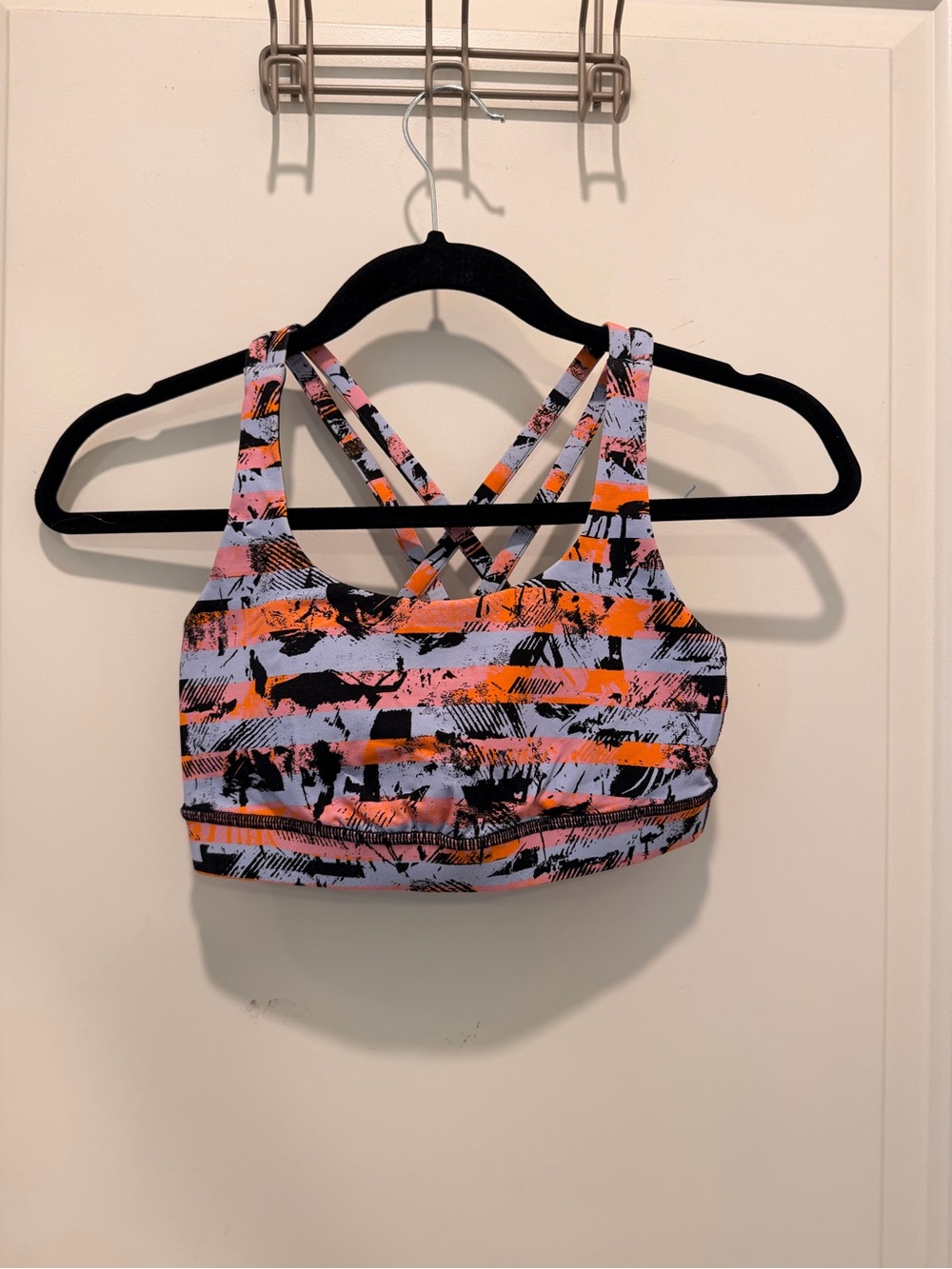 Billabong Crisscross Sports Bra in Pink, Orange & Black Abstract